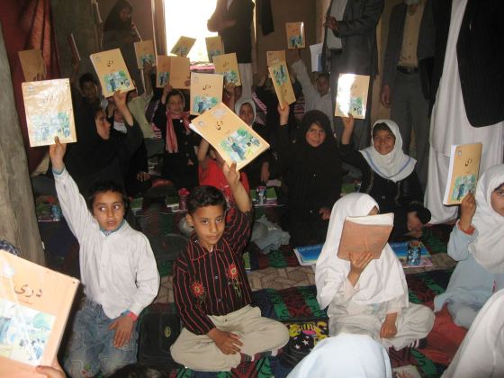School books being used by children at school in Herat, Afghanistan